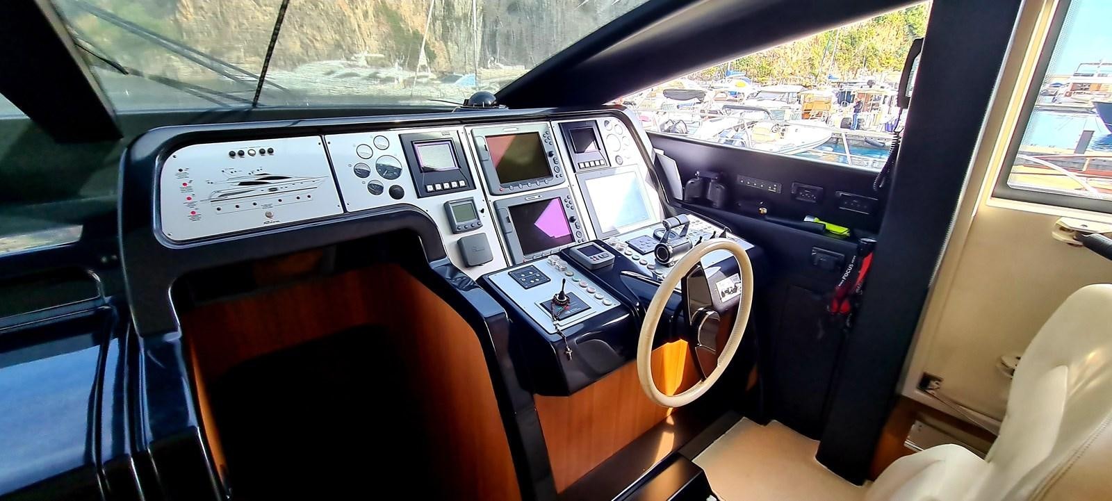 inside of a car aboard RITAKI 7 Yacht for Sale