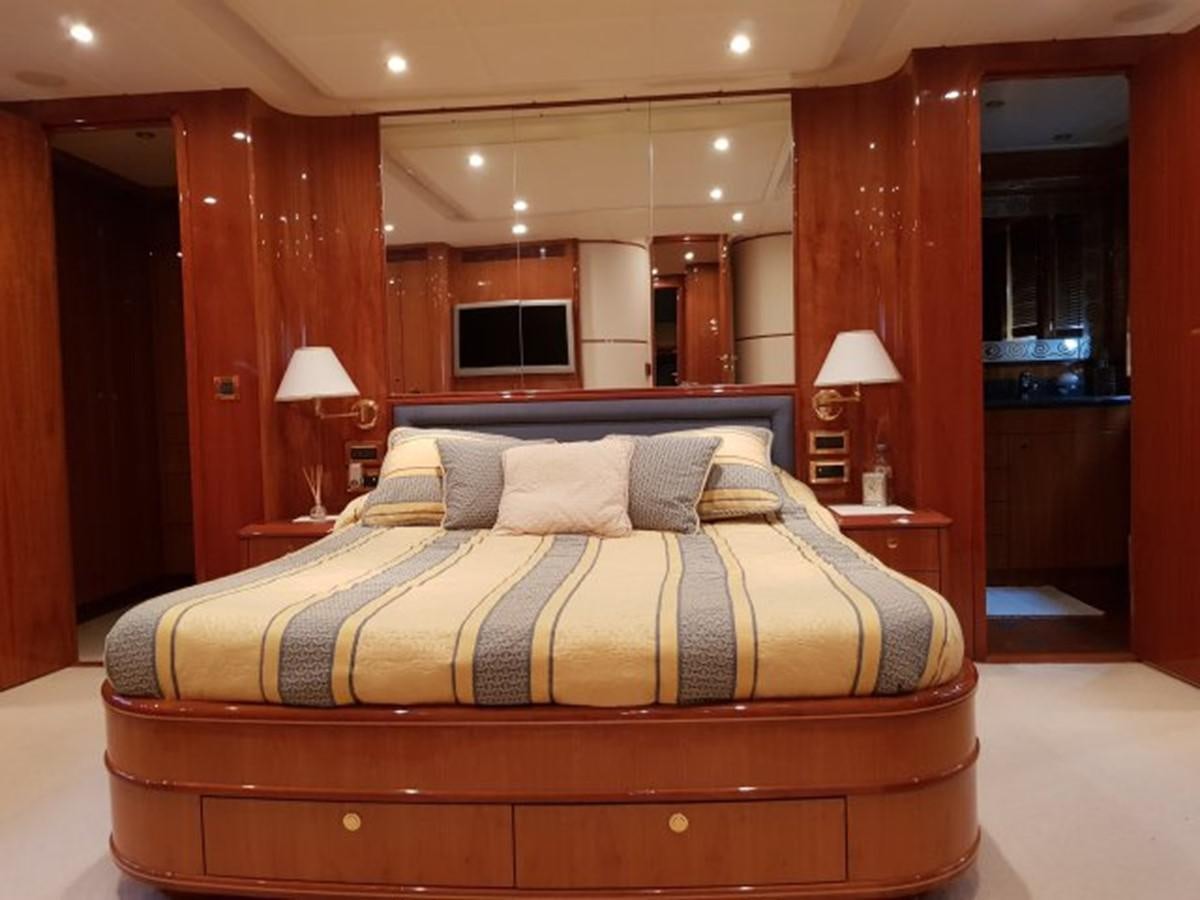 a bed in a room aboard BLUE DEEP Yacht for Sale