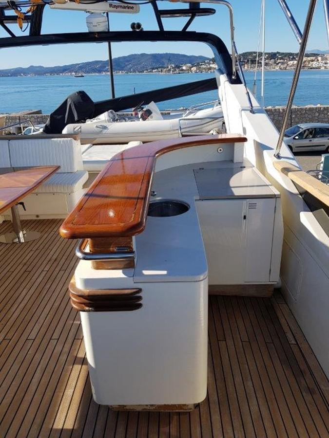 a boat on a deck aboard BLUE DEEP Yacht for Sale