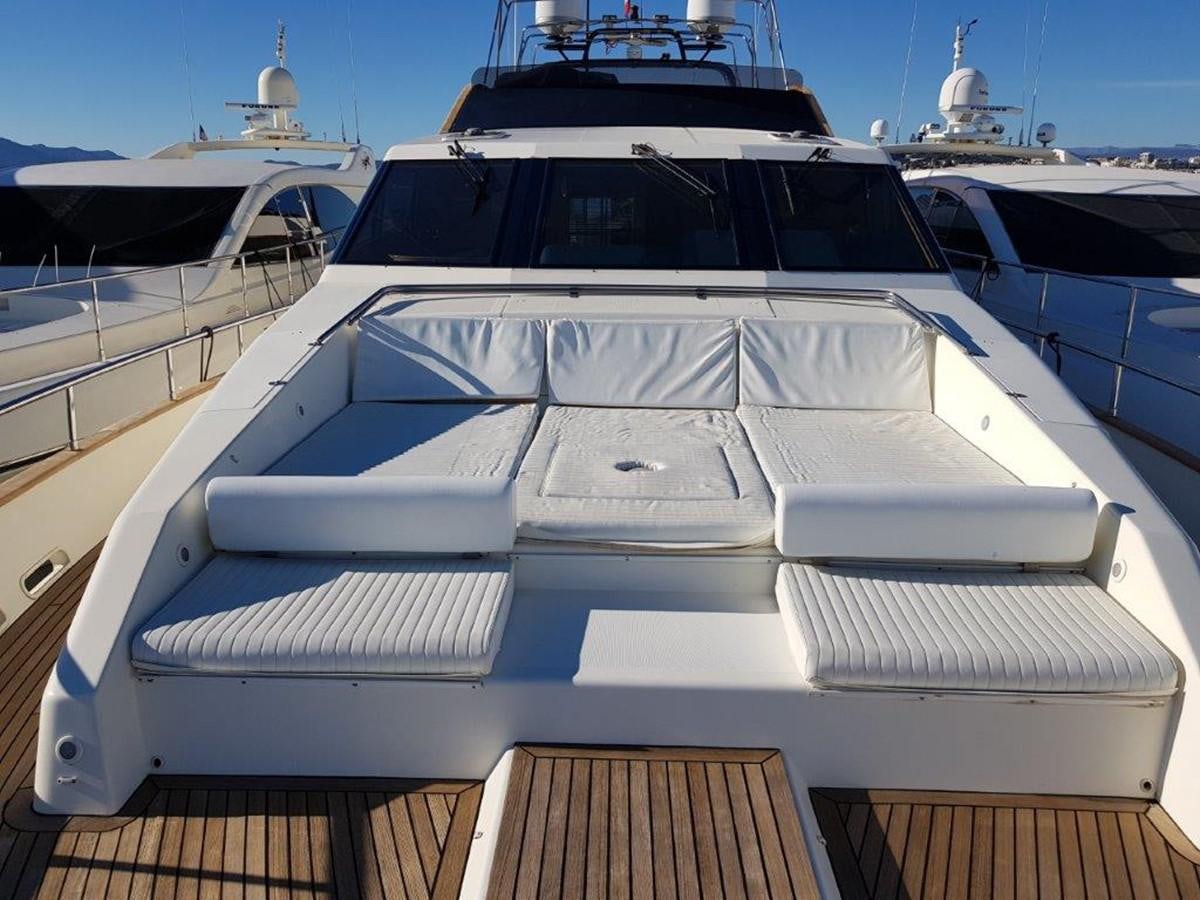 a white yacht with a deck aboard BLUE DEEP Yacht for Sale