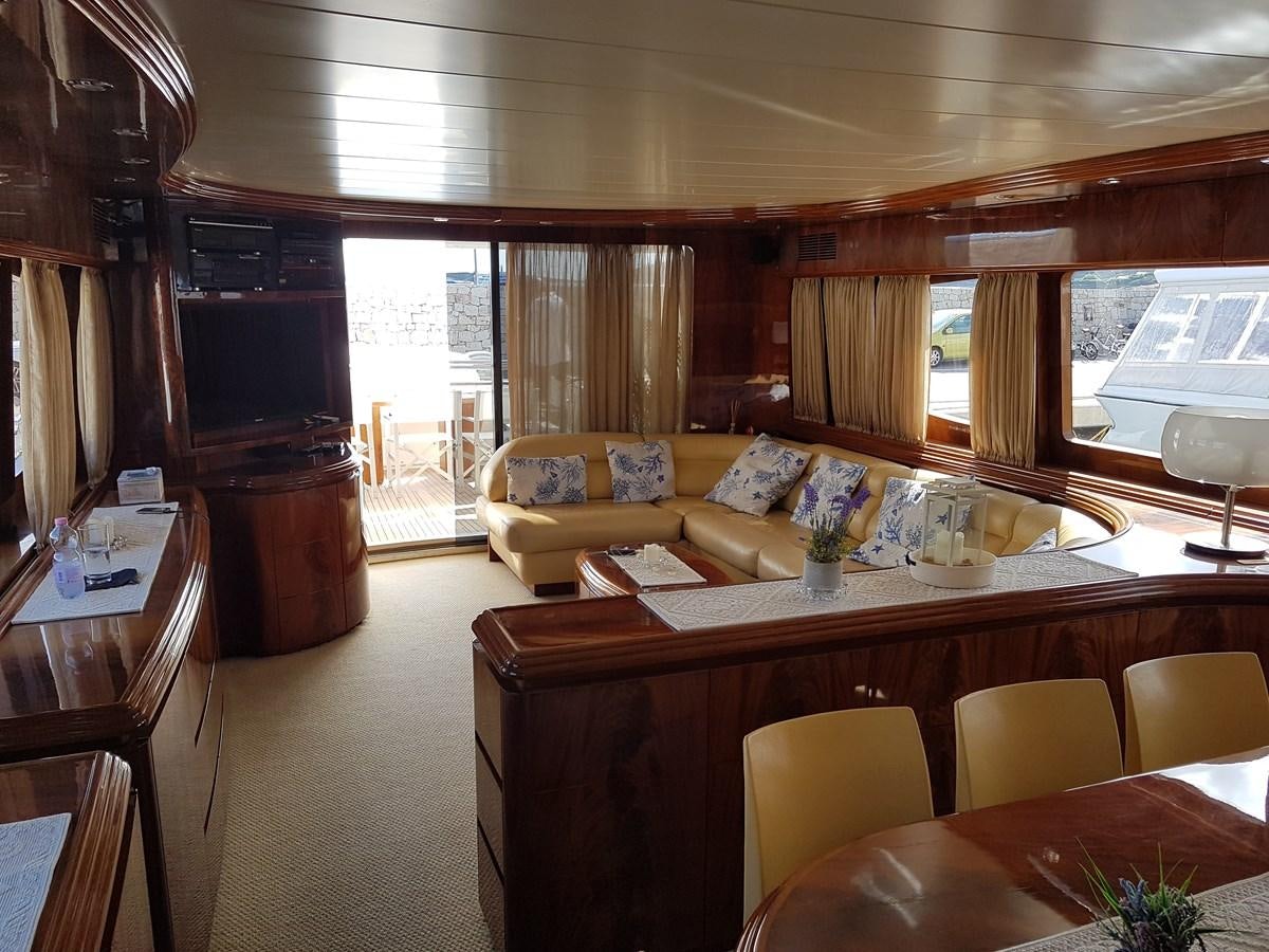 a living room with a couch and a table aboard GEMINI 3 Yacht for Sale
