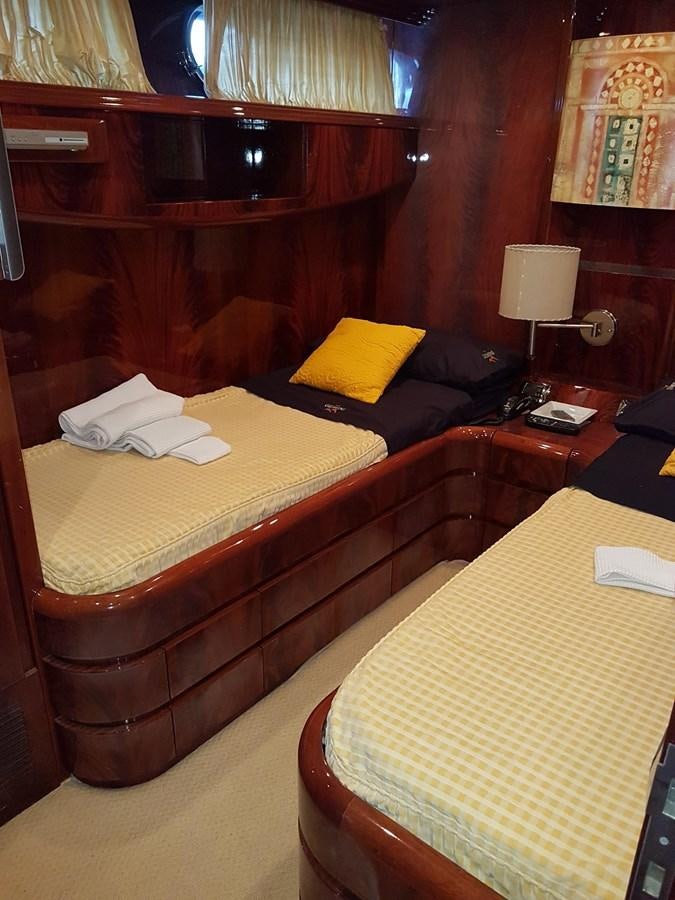 a couple of beds in a room aboard GEMINI 3 Yacht for Sale