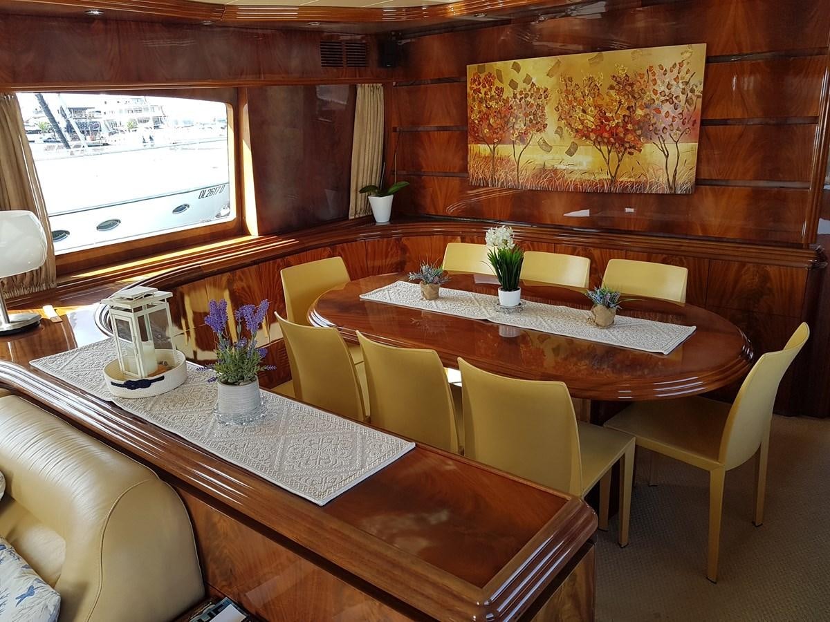 a dining room with a table aboard GEMINI 3 Yacht for Sale