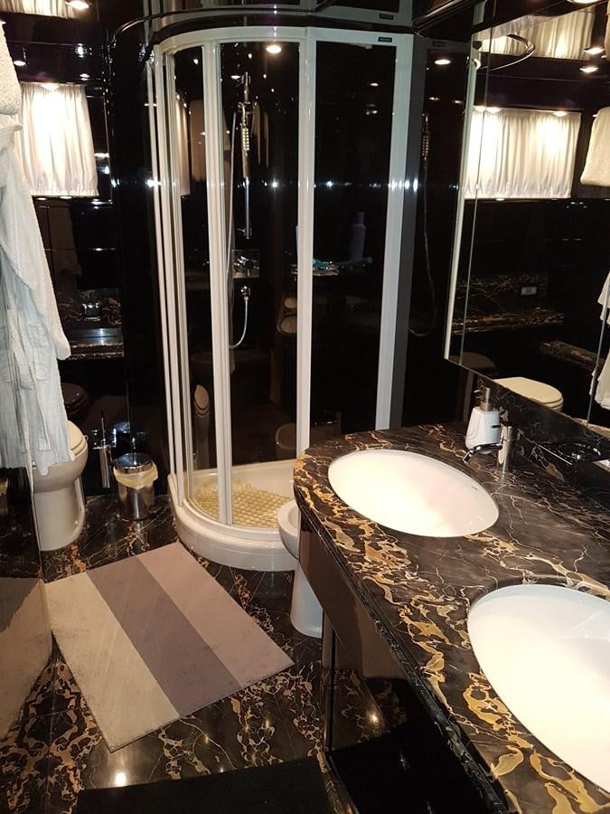 a bathroom with a stand up shower aboard GEMINI 3 Yacht for Sale