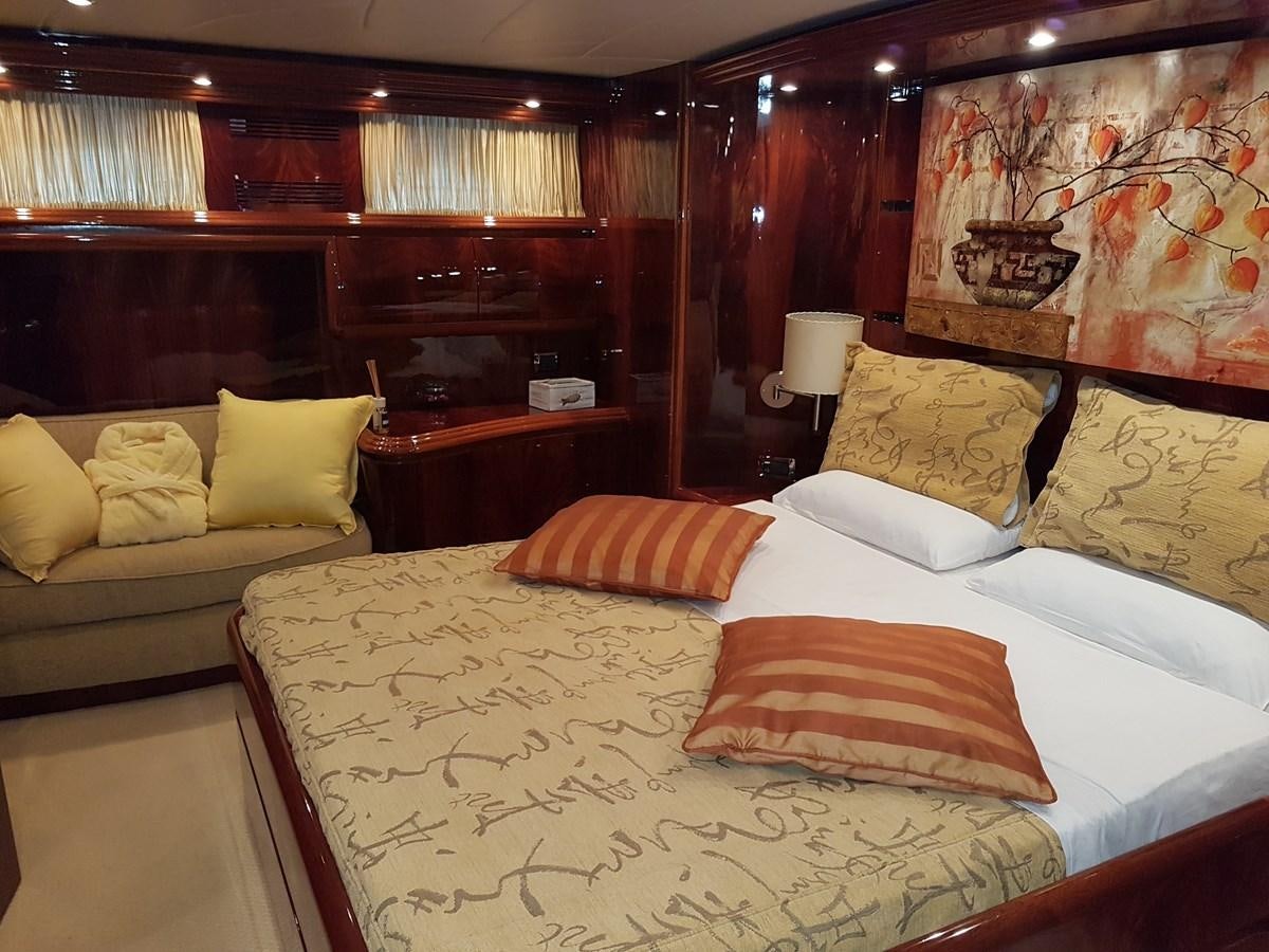 a room with a bed and a couch aboard GEMINI 3 Yacht for Sale