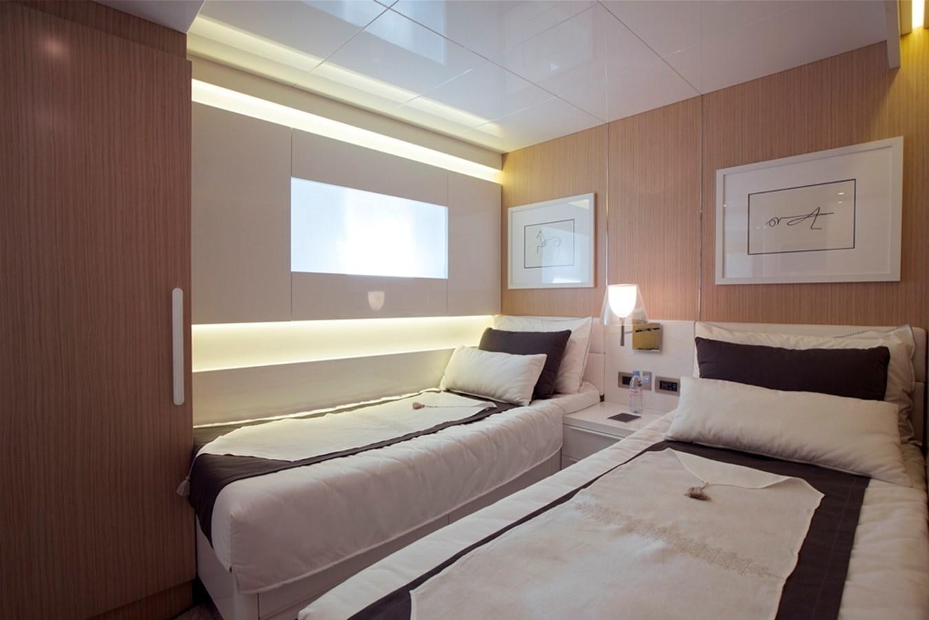 a room with two beds aboard PANGEA Yacht for Sale
