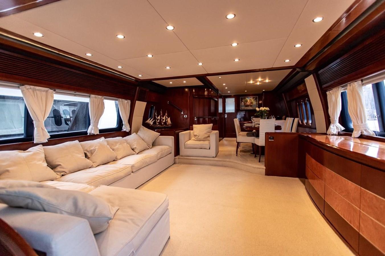a large living room with a large window aboard PRINCESS 25 M Yacht for Sale