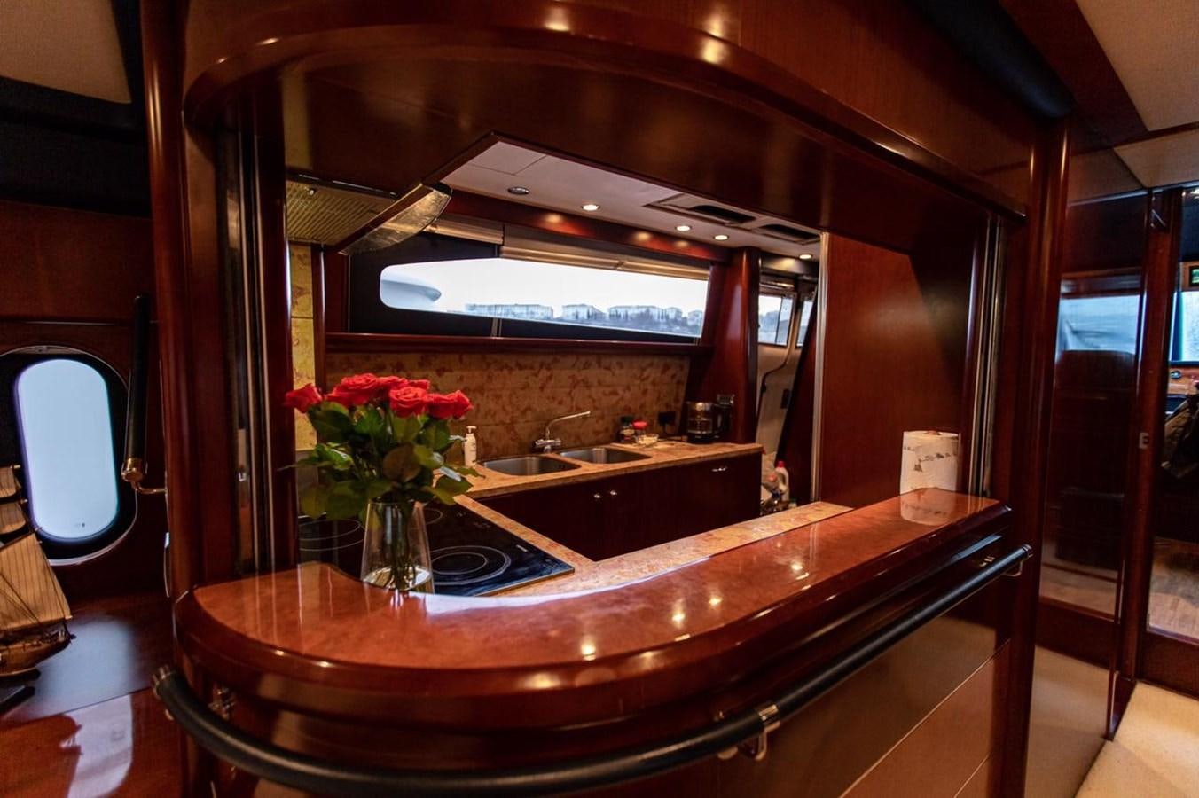 a bathroom with a large mirror aboard PRINCESS 25 M Yacht for Sale