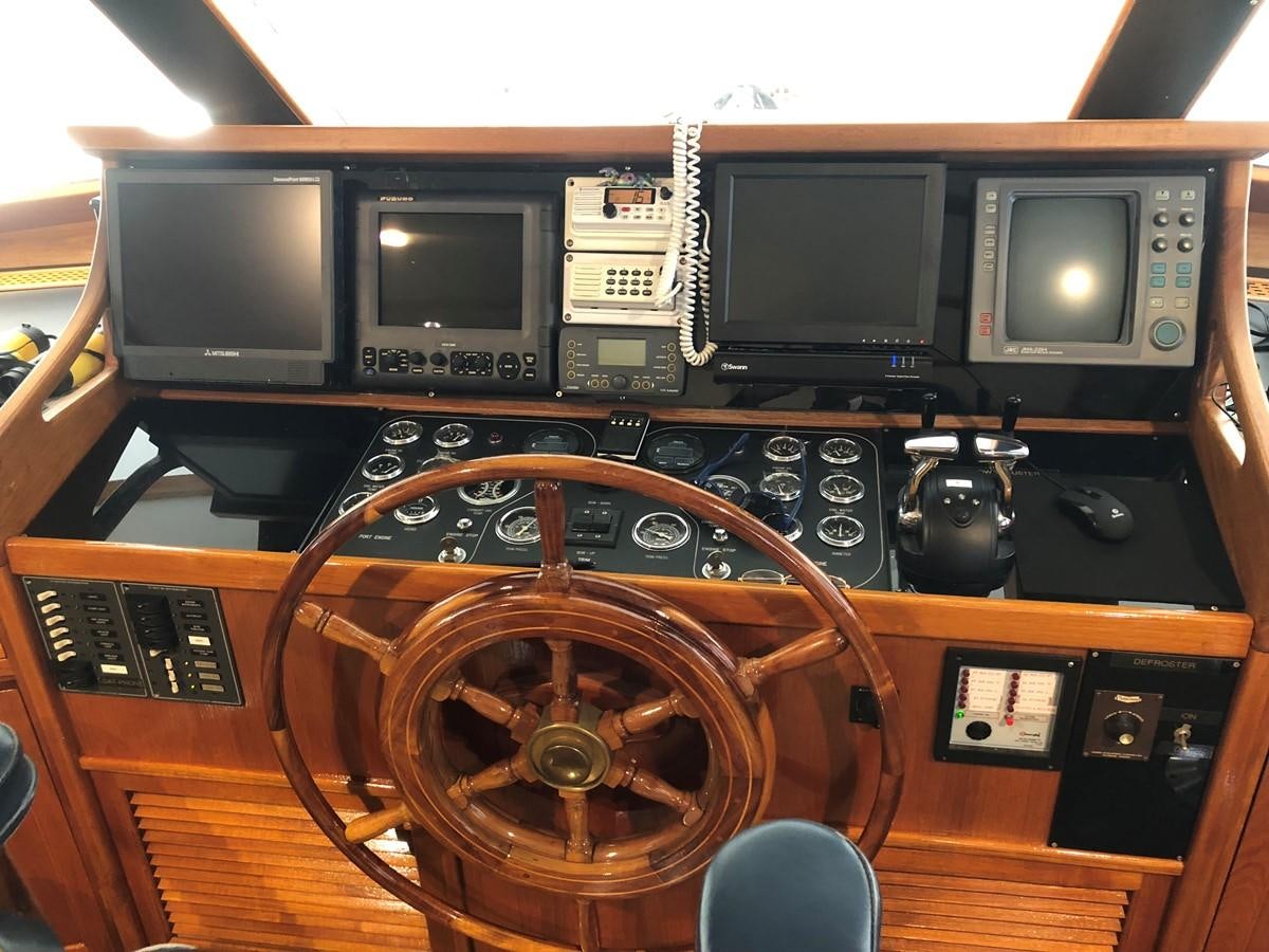 a radio and speakers on a table aboard GOLDEN EAGLE Yacht for Sale