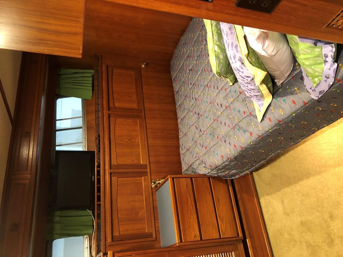a room with a painting on the wall aboard GOLDEN EAGLE Yacht for Sale