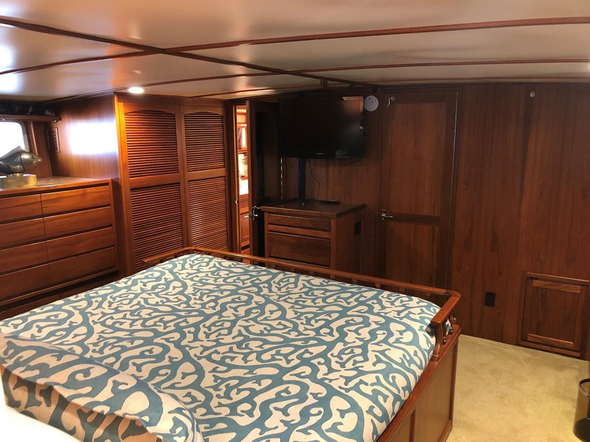 a bed in a room aboard GOLDEN EAGLE Yacht for Sale