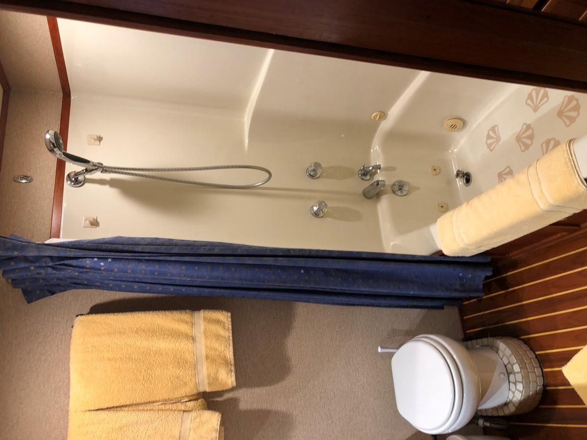a bathroom with a sink and a toilet aboard GOLDEN EAGLE Yacht for Sale