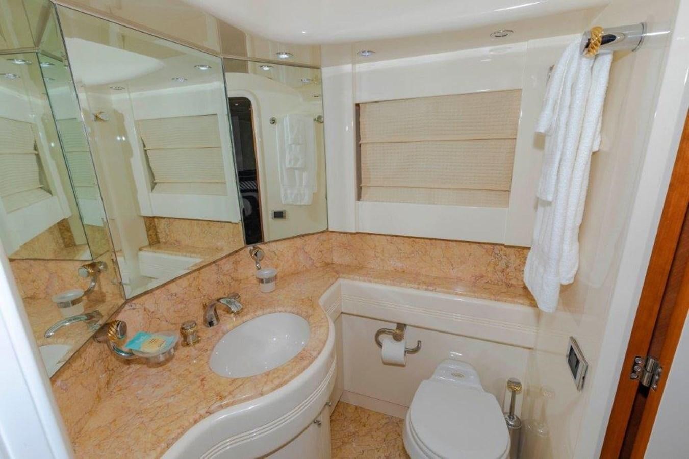 a bathroom with a sink and a toilet aboard DAY DREAMIN' Yacht for Sale
