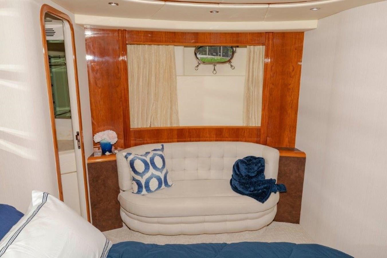 a white couch in a room aboard DAY DREAMIN' Yacht for Sale