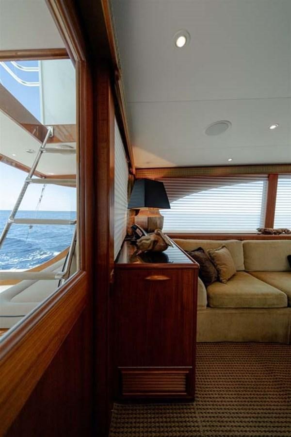 a room with a couch and a window aboard SILKY Yacht for Sale