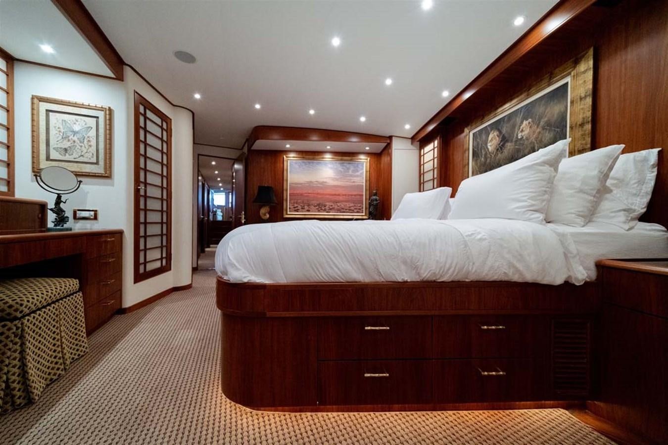 a bedroom with a large bed aboard SILKY Yacht for Sale