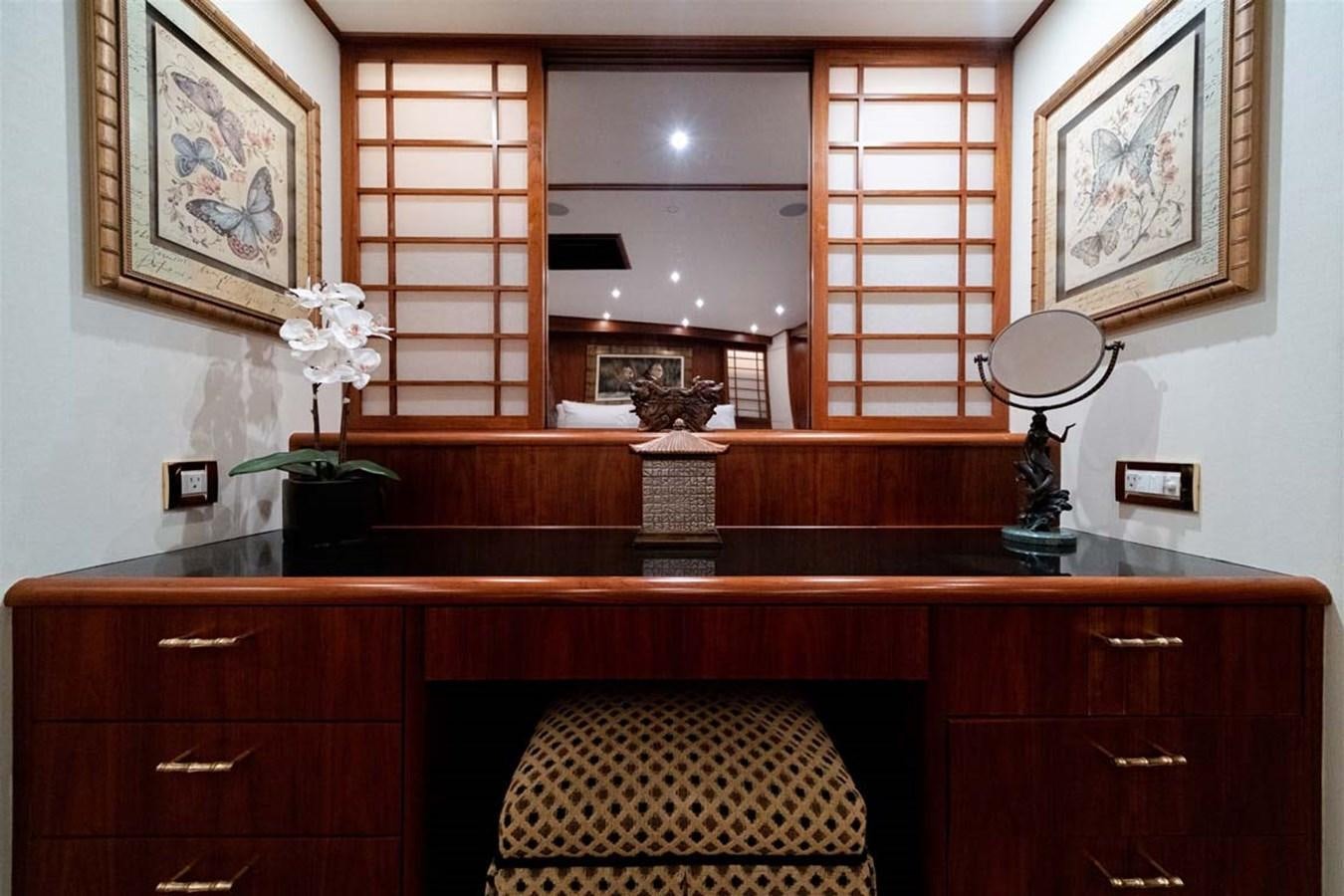 a room with a piano and a chair and a window aboard SILKY Yacht for Sale