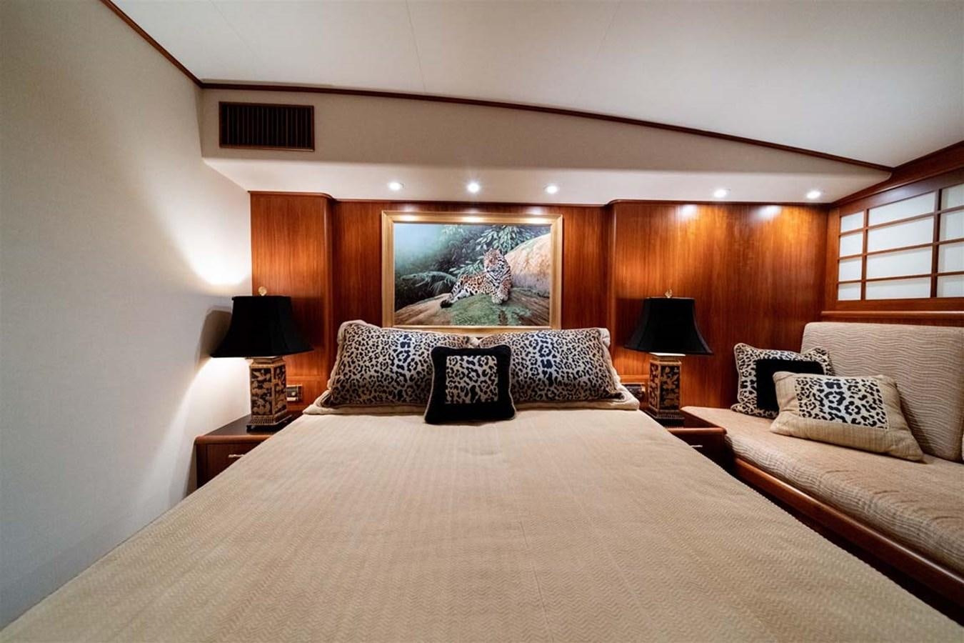a hotel room with a large bed aboard SILKY Yacht for Sale