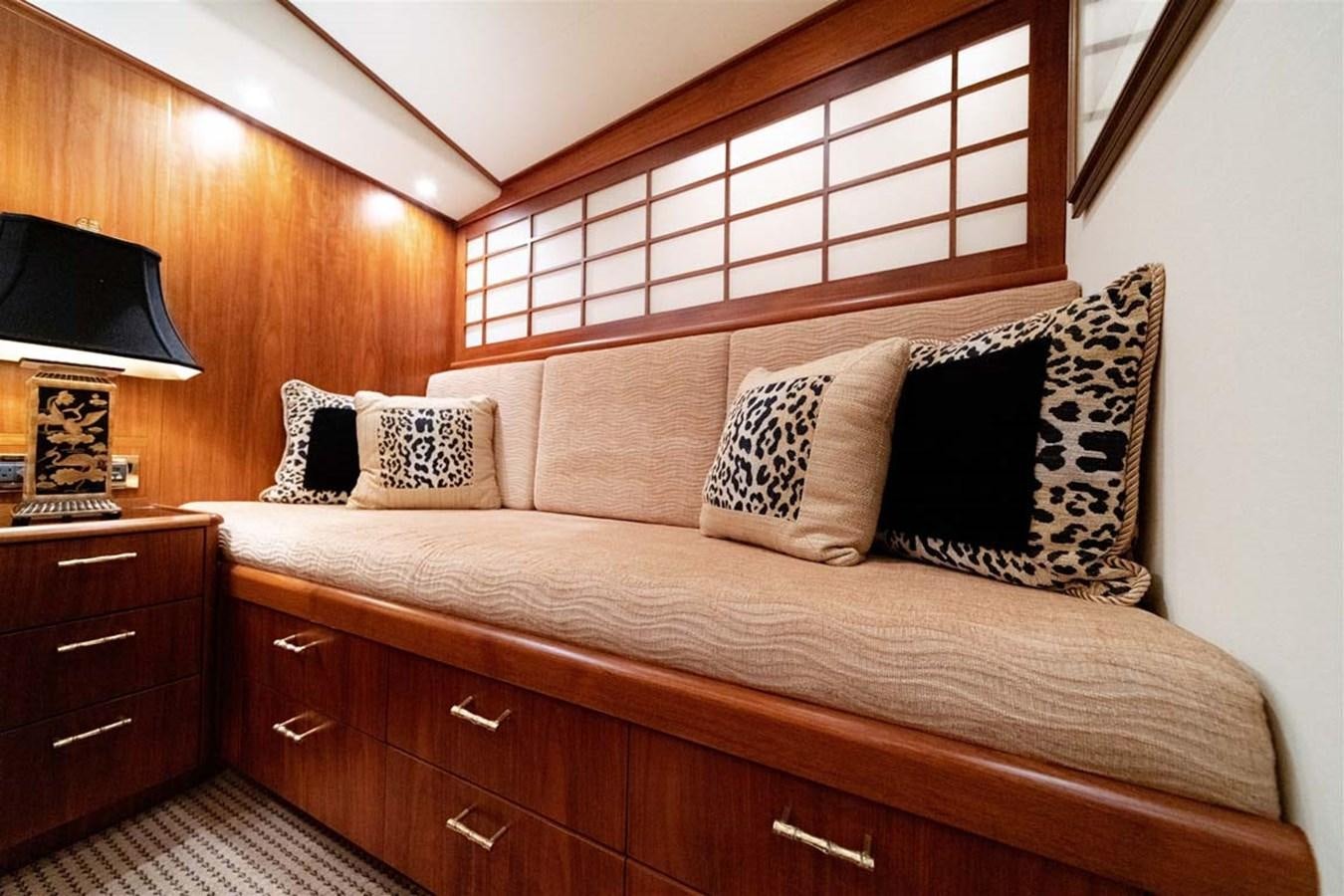 a bed with pillows on it aboard SILKY Yacht for Sale