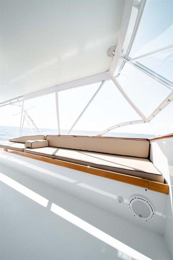 a wooden boat on a deck aboard SILKY Yacht for Sale