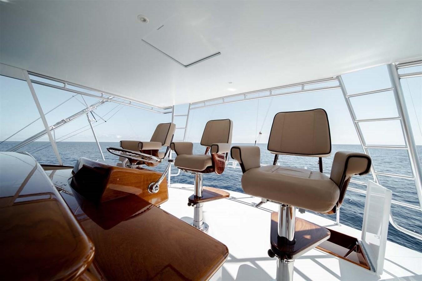 a room with chairs and tables aboard SILKY Yacht for Sale