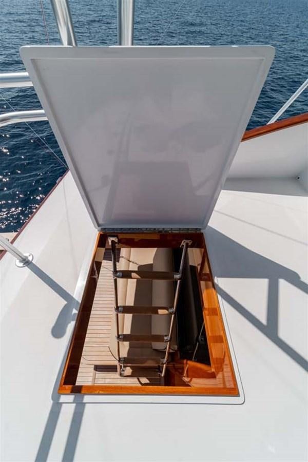 a boat with a large white sail aboard SILKY Yacht for Sale