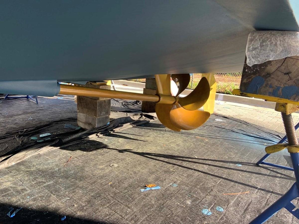 a yellow metal object on a wooden surface aboard SILKY Yacht for Sale
