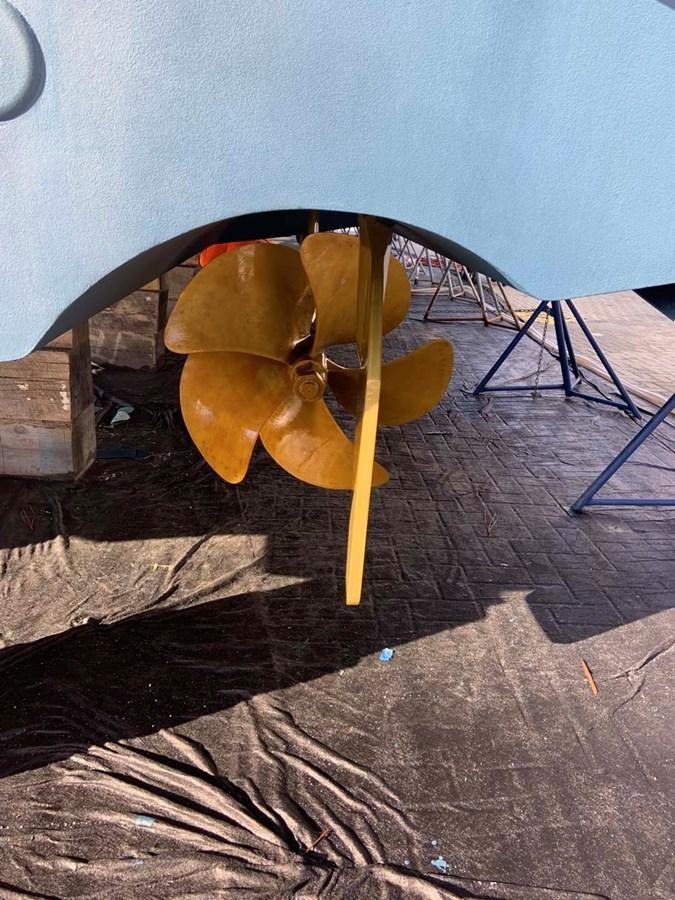 a yellow flower on a black surface aboard SILKY Yacht for Sale