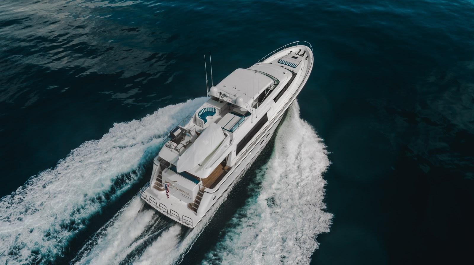 a ship on the water aboard NOW OR NEVER Yacht for Sale