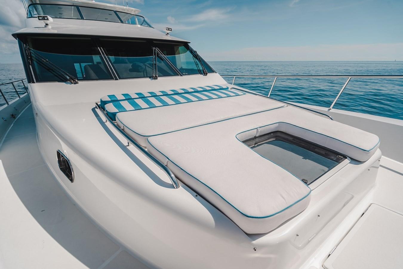 a boat on the water aboard NOW OR NEVER Yacht for Sale