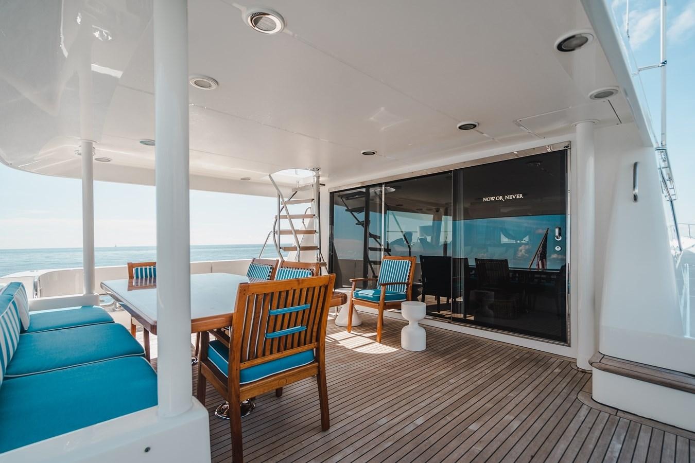 a boat on the water aboard NOW OR NEVER Yacht for Sale