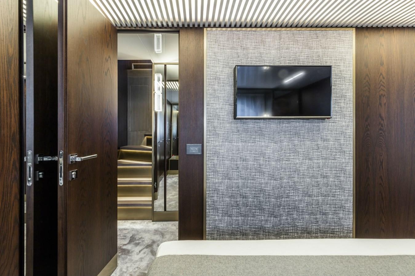 a room with a door and a mirror aboard FERRETTI YACHTS 850 HT  Yacht for Sale