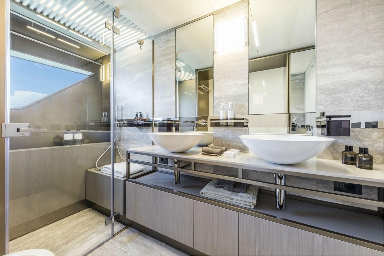 a bathroom with a large mirror aboard FERRETTI YACHTS 850 HT  Yacht for Sale
