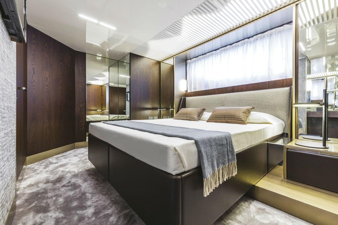 a large bedroom with a large bed aboard FERRETTI YACHTS 850 HT  Yacht for Sale