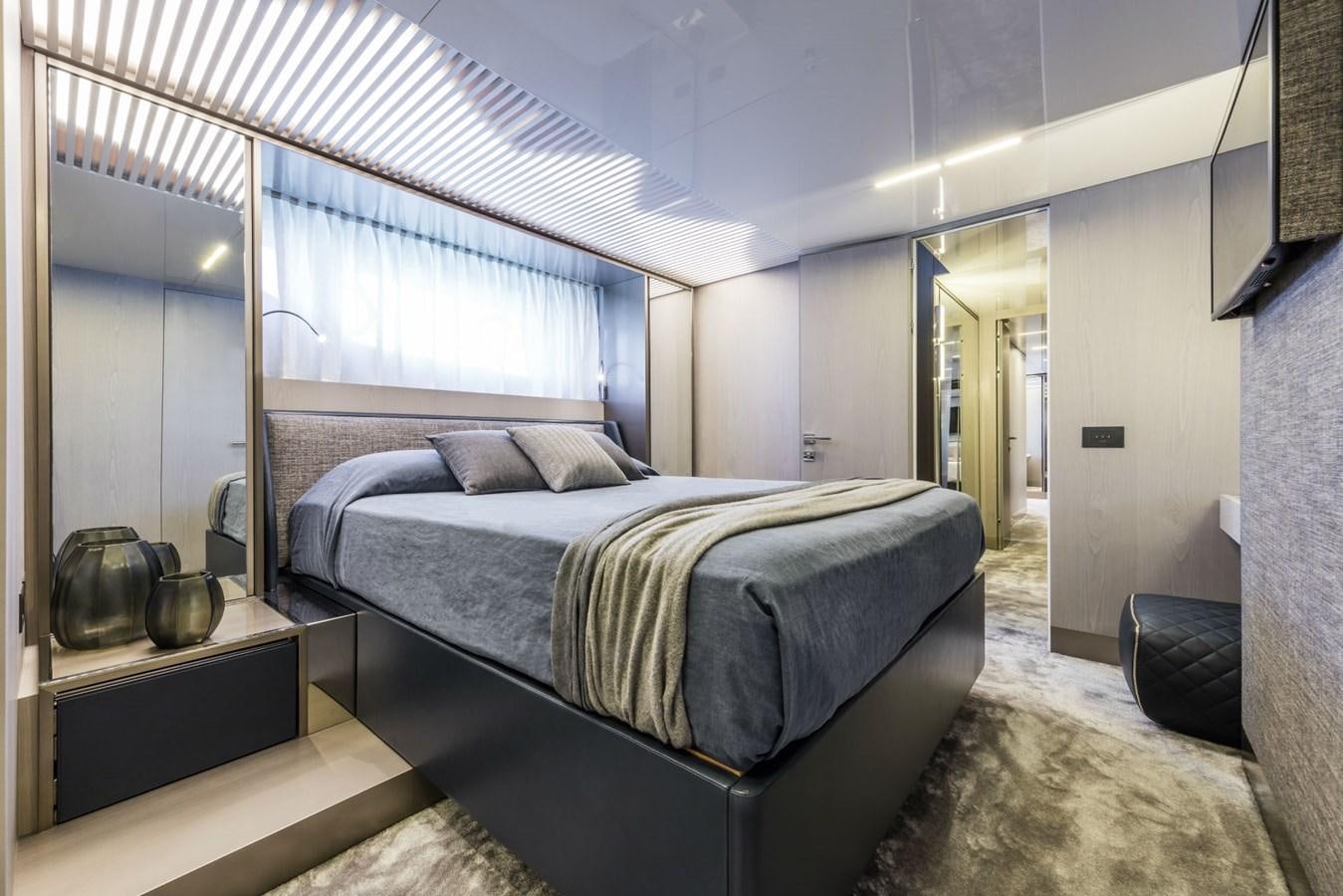 a bed in a room aboard FERRETTI YACHTS 850 HT  Yacht for Sale