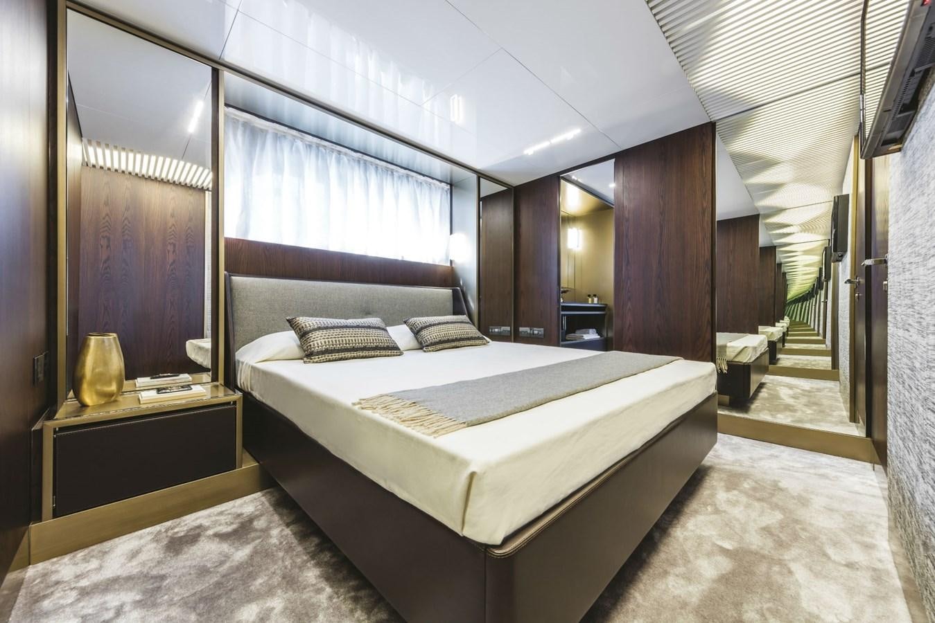a bed in a room aboard FERRETTI YACHTS 850 HT  Yacht for Sale