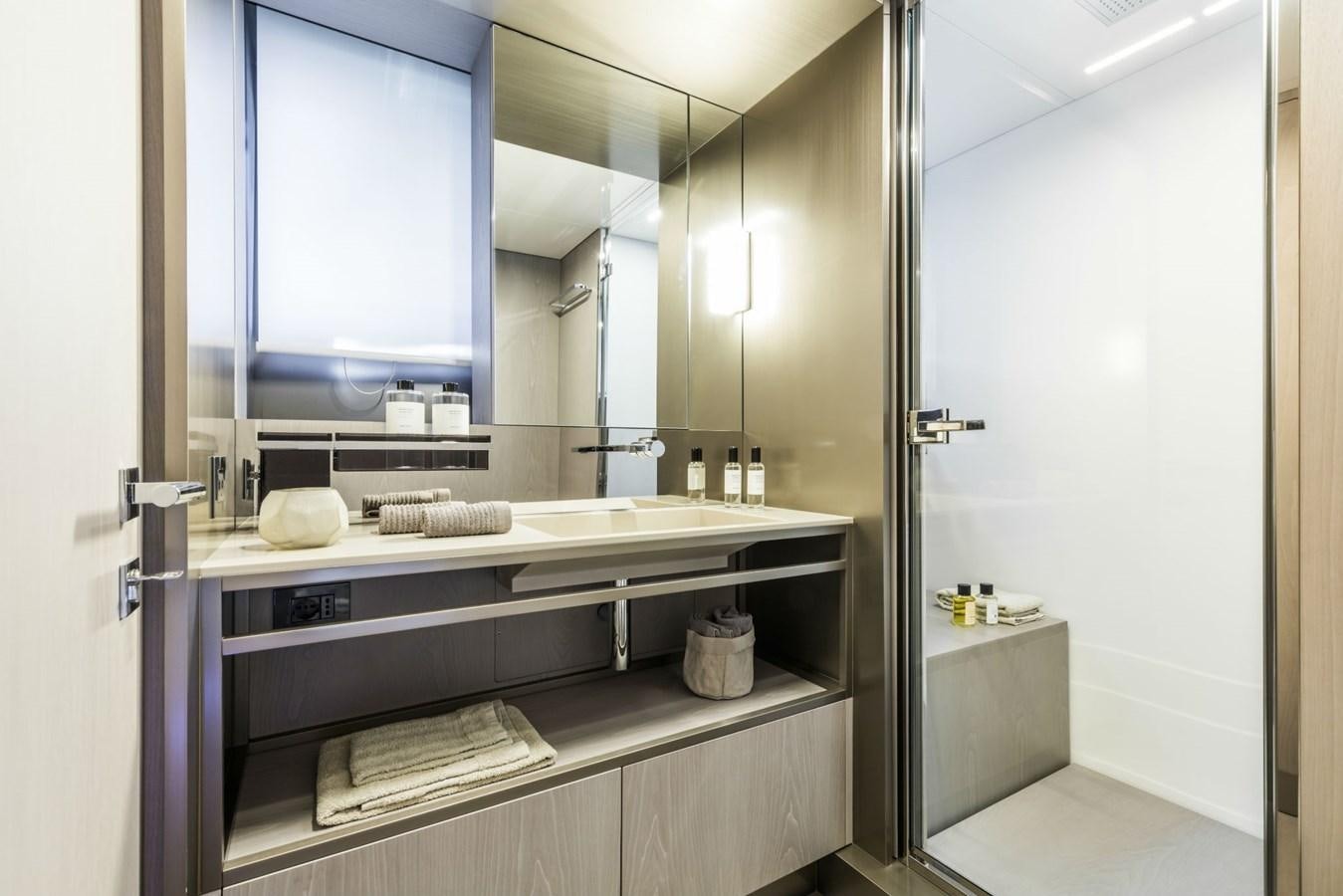 a bathroom with a large mirror aboard FERRETTI YACHTS 850 HT  Yacht for Sale