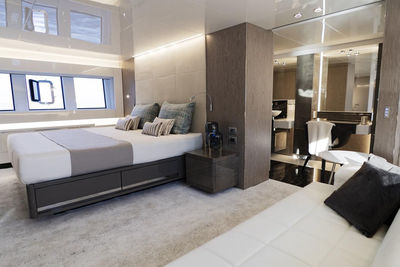 a bed in a room aboard ARCADIA A85 Yacht for Sale