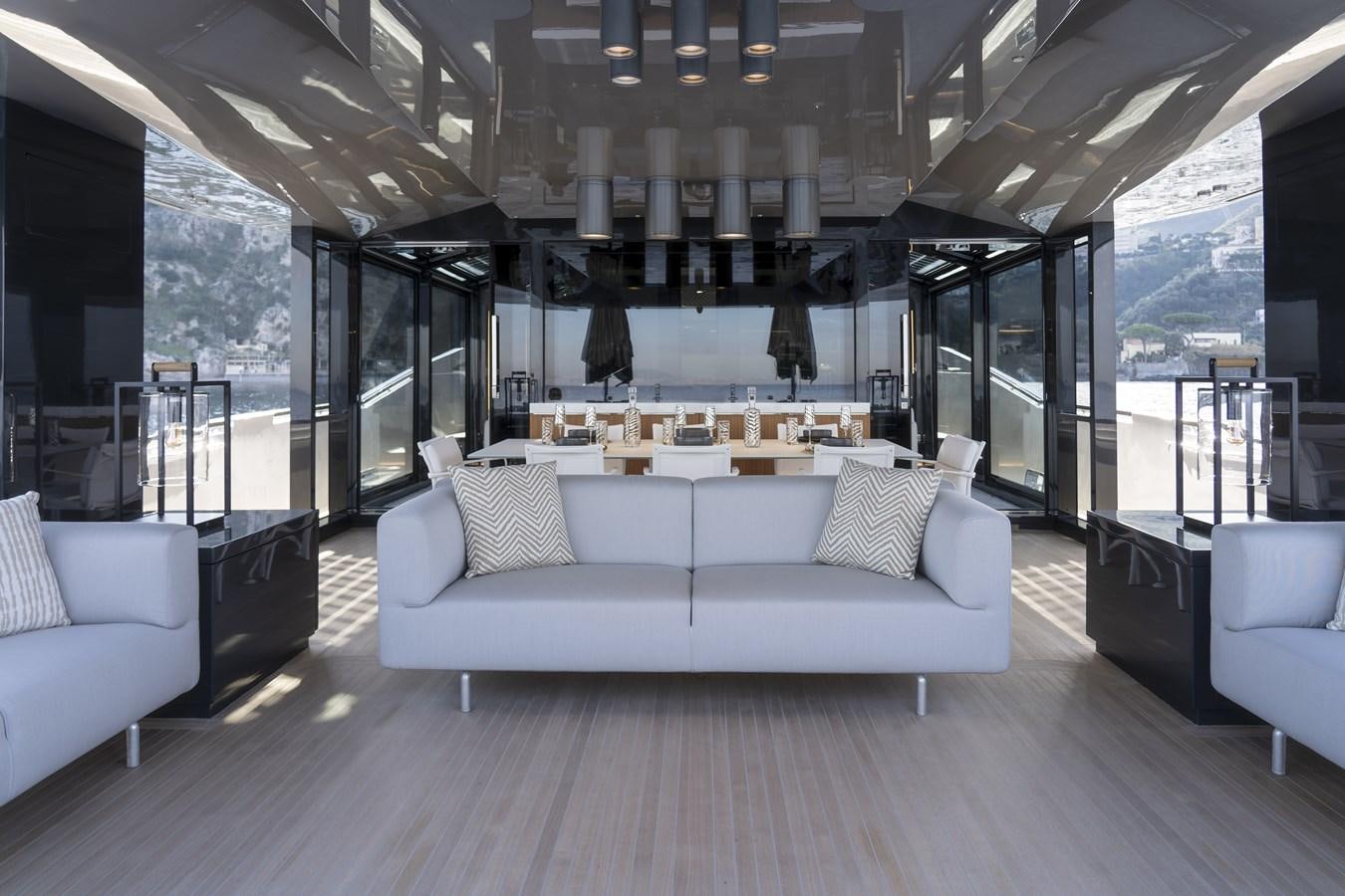 a living room with a large window aboard ARCADIA A85 Yacht for Sale