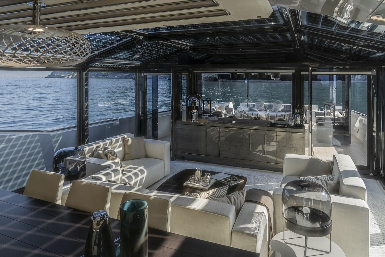a living room with a large window aboard ARCADIA A85 Yacht for Sale