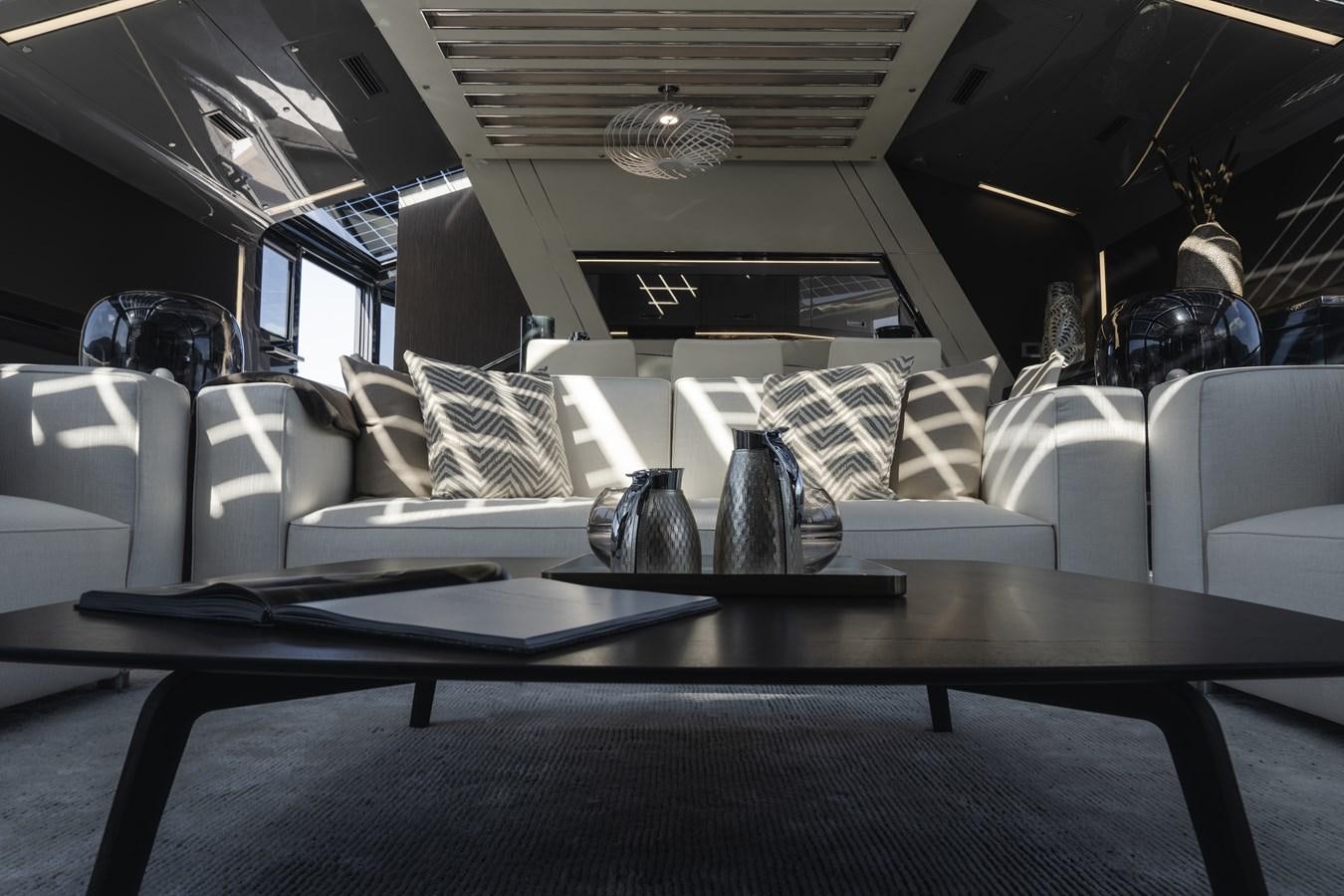 a vehicle with a table and chairs aboard ARCADIA A85 Yacht for Sale