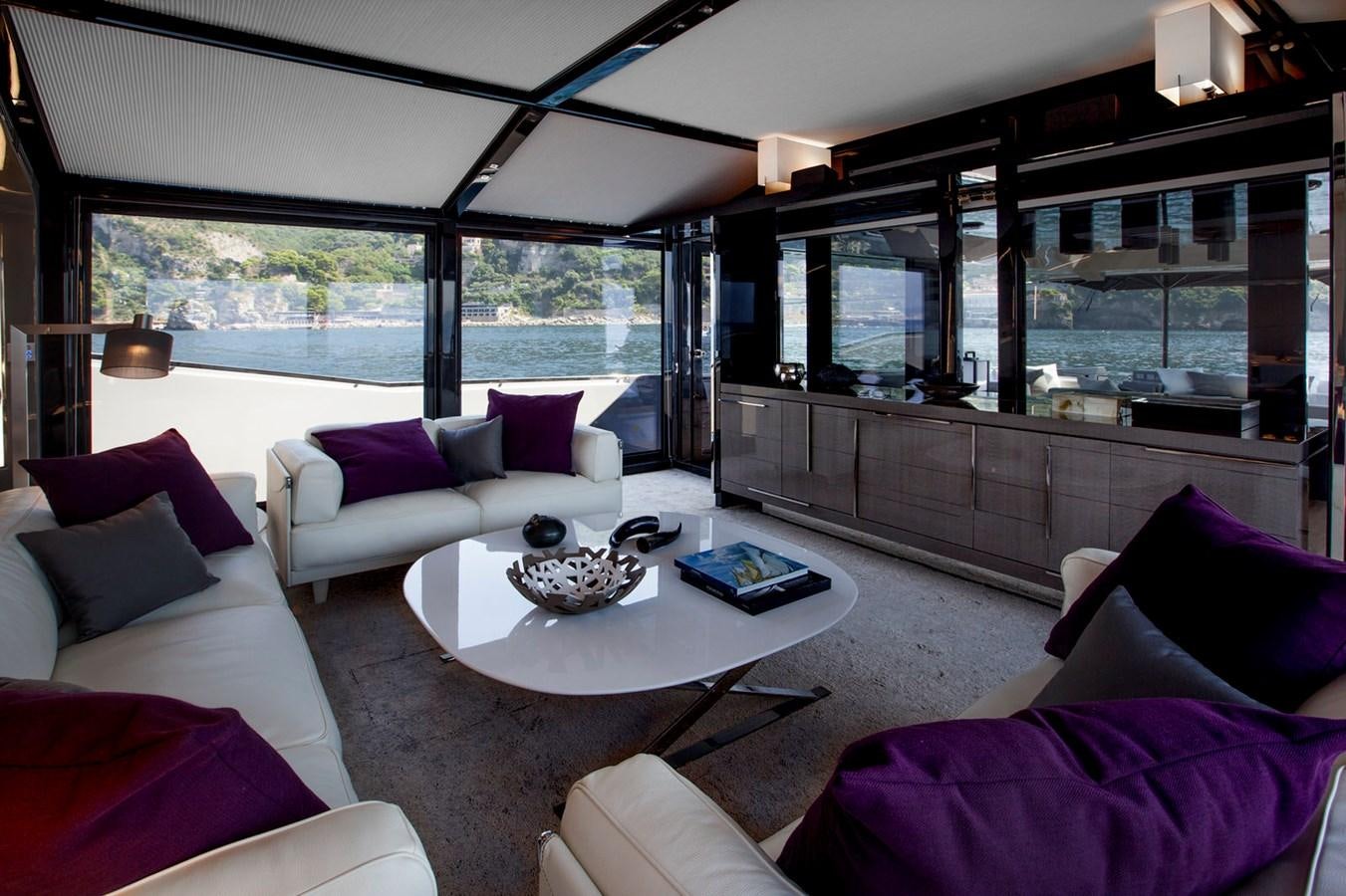 a living room with a large window aboard MARCELLO Yacht for Sale