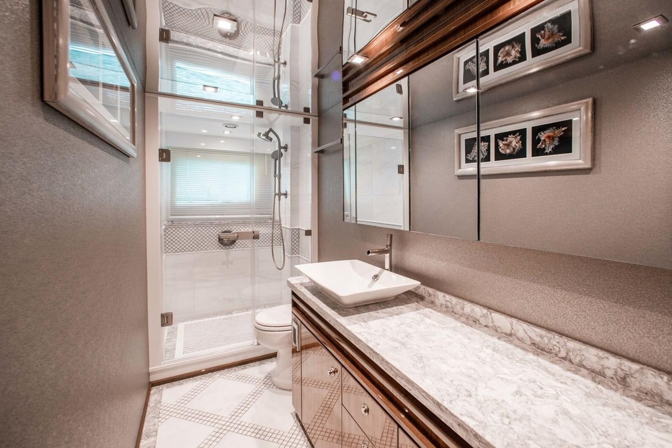a bathroom with a large bathtub aboard NEW VIKING 82 COCKPIT MOTOR YACHT Yacht for Sale