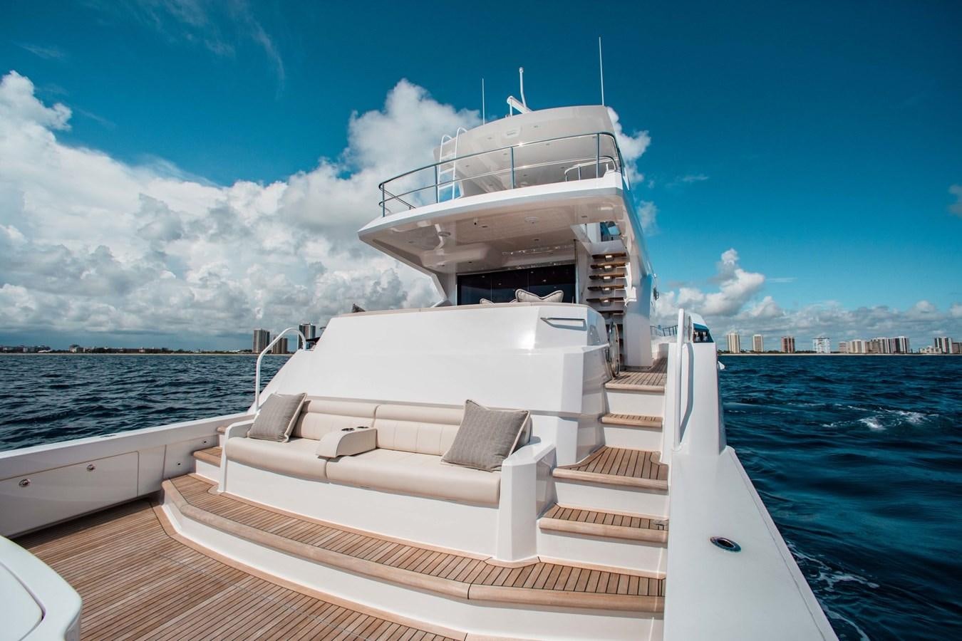 a boat on the water aboard NEW VIKING 82 COCKPIT MOTOR YACHT Yacht for Sale