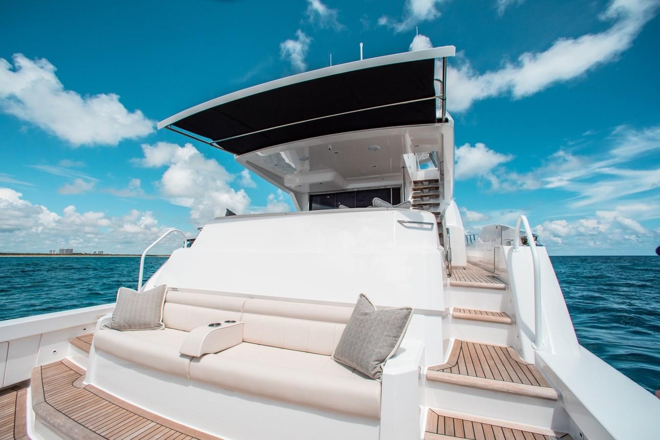 a boat on the water aboard NEW VIKING 82 COCKPIT MOTOR YACHT Yacht for Sale