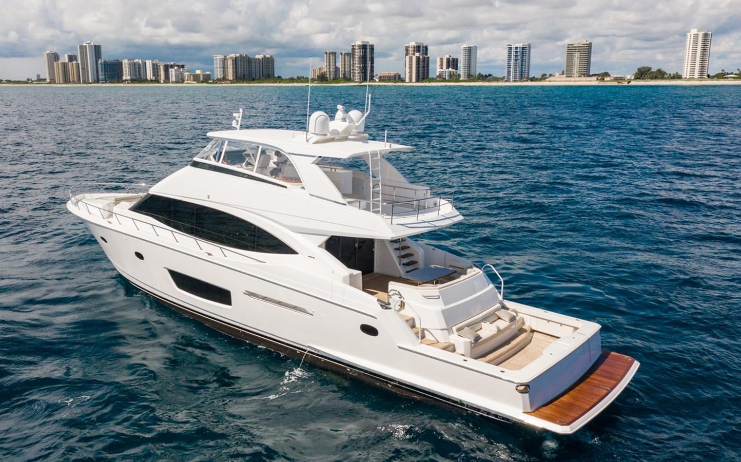 a boat on the water aboard NEW VIKING 82 COCKPIT MOTOR YACHT Yacht for Sale