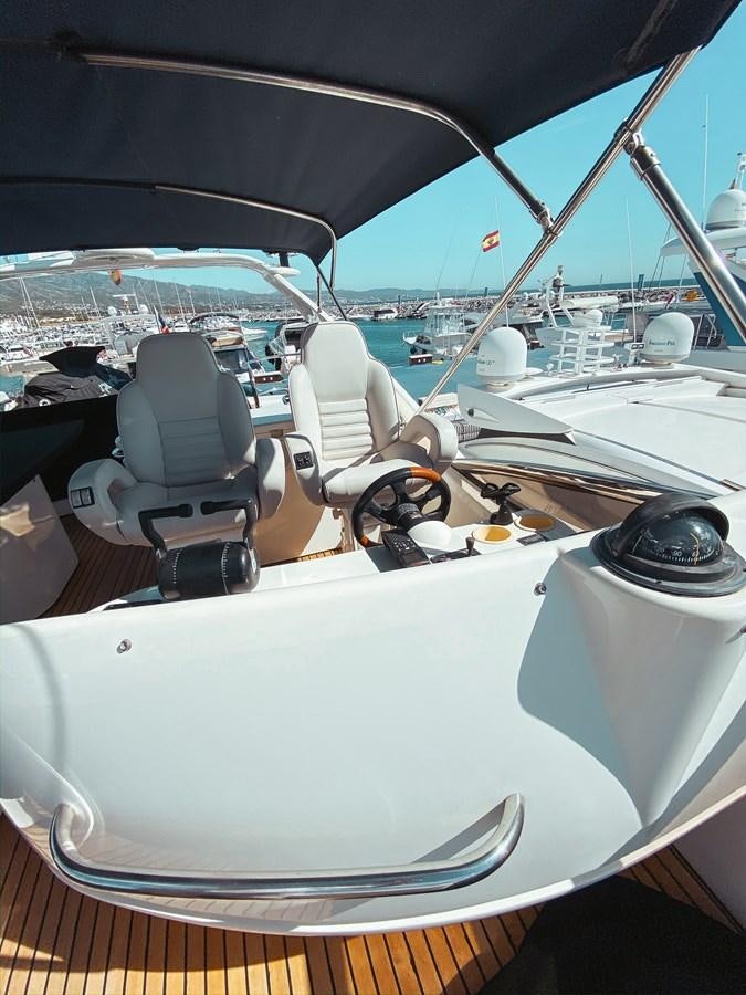 the cockpit of a boat aboard HELENA Yacht for Sale