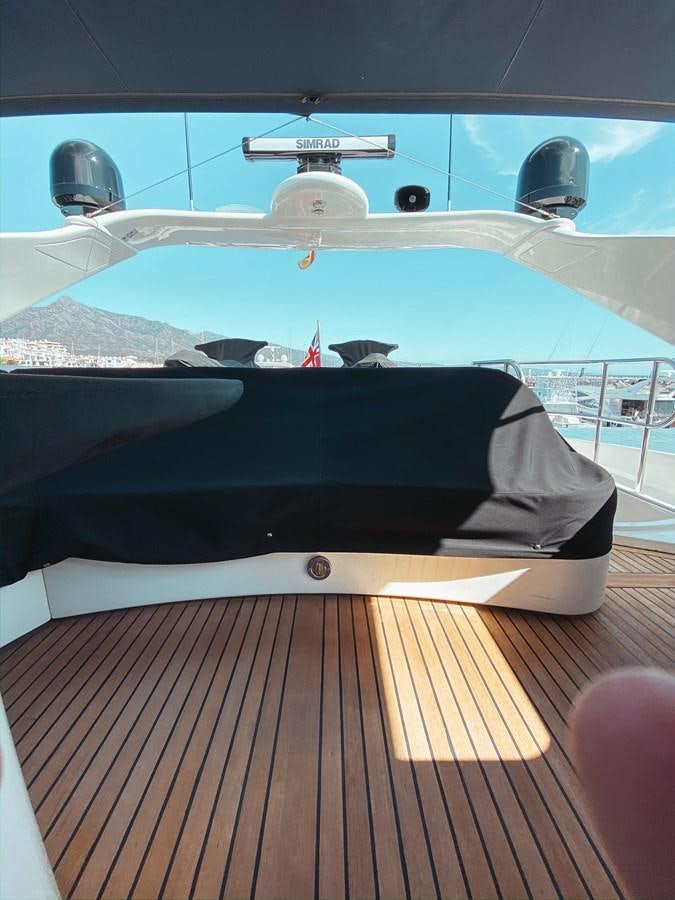 a boat on a deck aboard HELENA Yacht for Sale