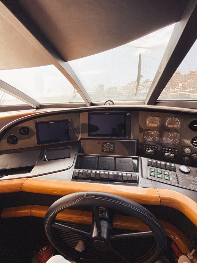 the inside of a car aboard HELENA Yacht for Sale