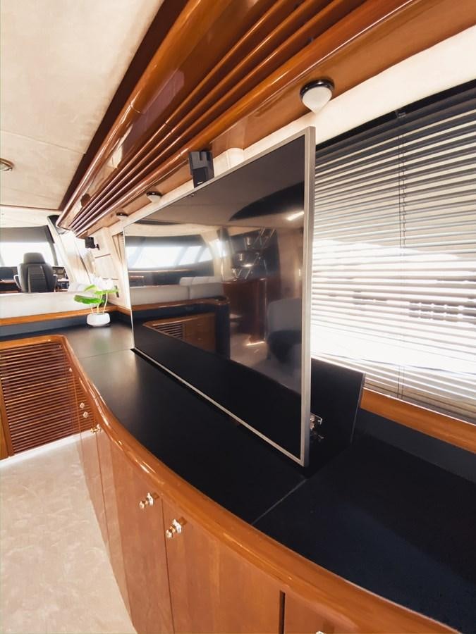 a kitchen with a black counter aboard HELENA Yacht for Sale